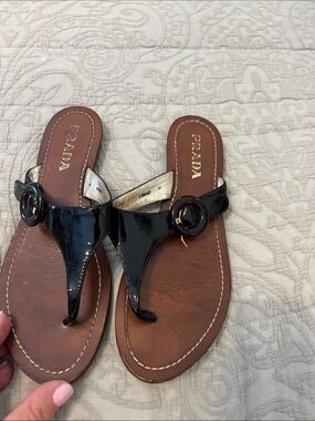 Prada Black Patent Leather Thong Sandals with Circular Buckles